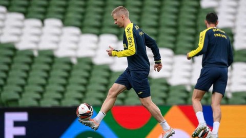 战火中的绿茵坚守：津琴科领衔乌克兰欧国联备战纪实