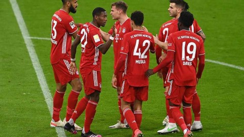 安联球场的红白风暴：拜仁慕尼黑2比0完胜勒沃库森，迈向德甲九连冠